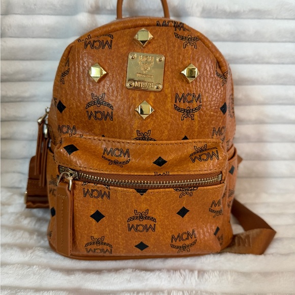MCM Cognac PVCLeather Backpack with Gold Accents - Picture 1 of 6